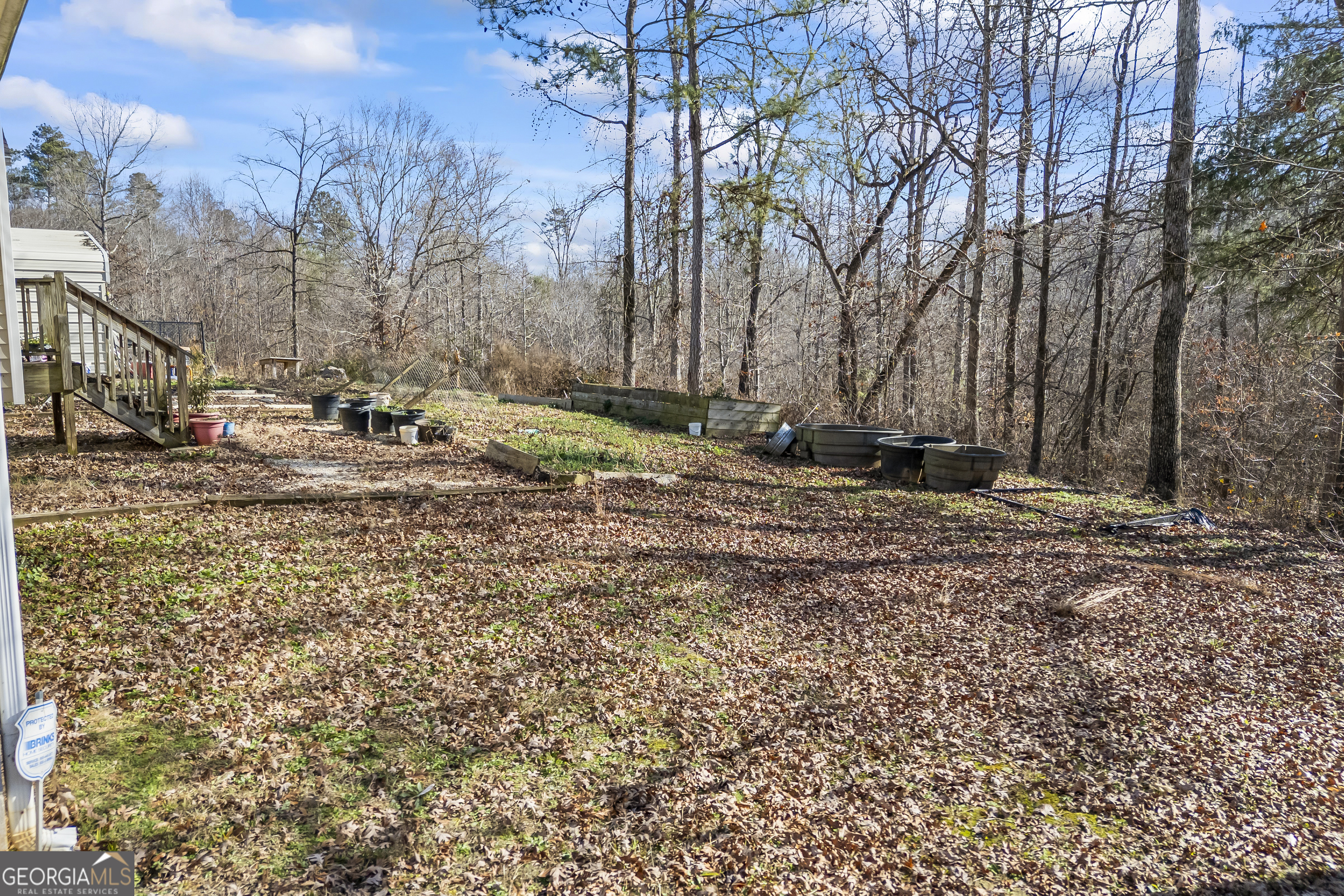 747 Washington Road Lexington, GA 30648 - Photo 83 of 118 a backyard of a house with lots of green space