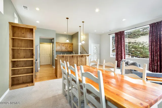 a view of a living room and front door