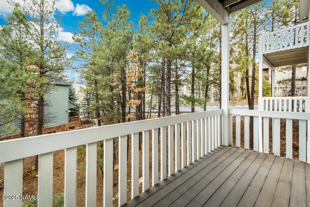 a view of a wooden fence