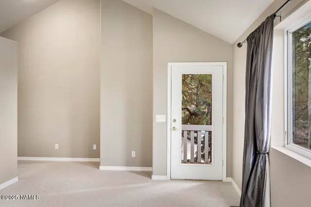 a view of a room with staircase
