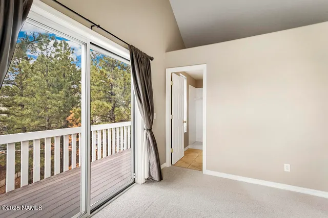 a view of a room with a large window