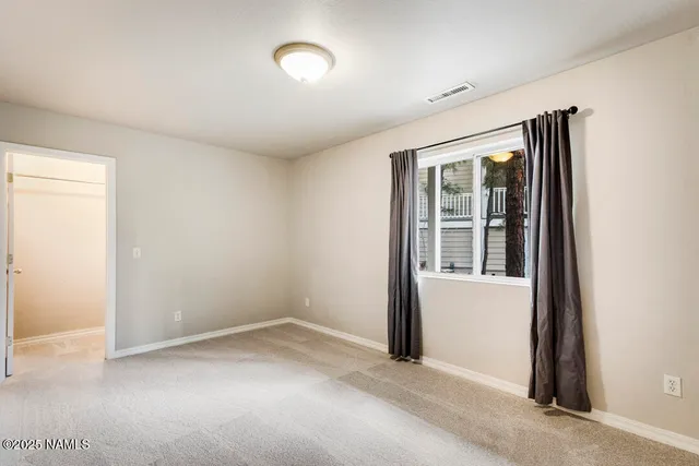 a room with table and chairs