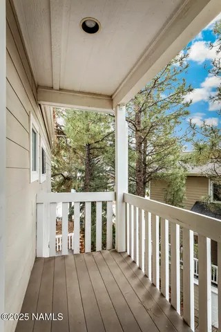 a view of a large building with a yard