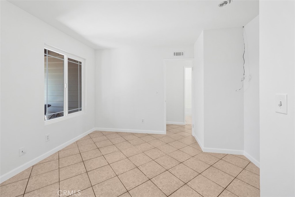 10424 2nd Street Santee, CA 92071 - Photo 11 of 28 Flexible dining or bonus area offers a bright, open space that can easily adapt to your needs. Its central location supports a comfortable flow between rooms.