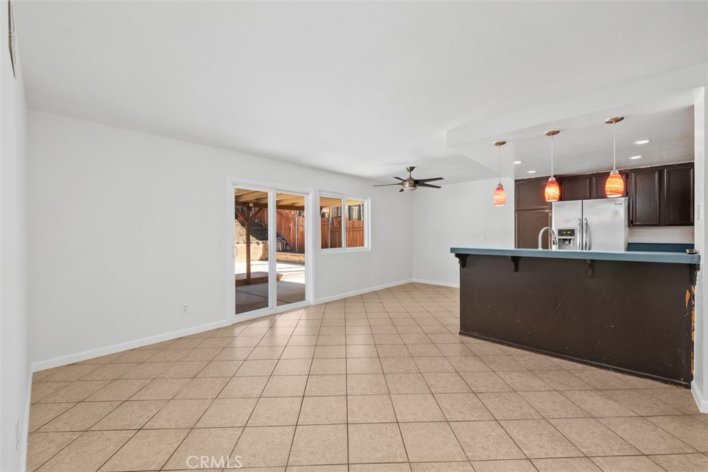 10424 2nd Street Santee, CA 92071 - Photo 28 of 28 Open living and dining layout provides a seamless connection between main living spaces. The broad floorplan makes the home feel comfortable, functional, and easy to enjoy.