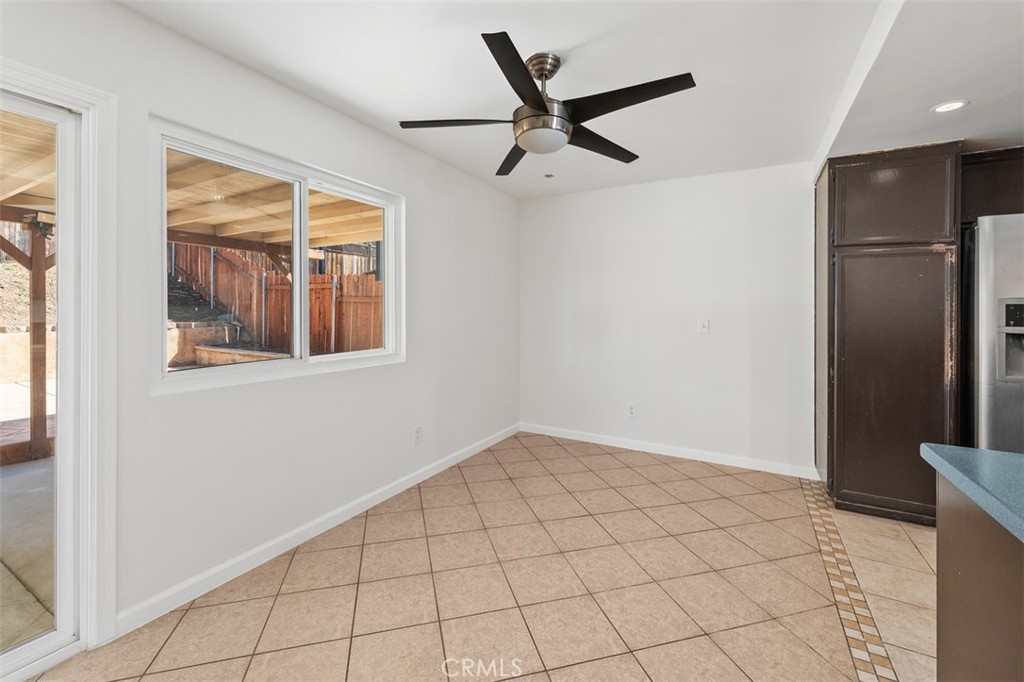 10424 2nd Street Santee, CA 92071 - Photo 15 of 28 Dining area just off the kitchen feels bright and inviting, with a ceiling fan overhead for added comfort. It is an easy spot for morning coffee or weeknight dinners.