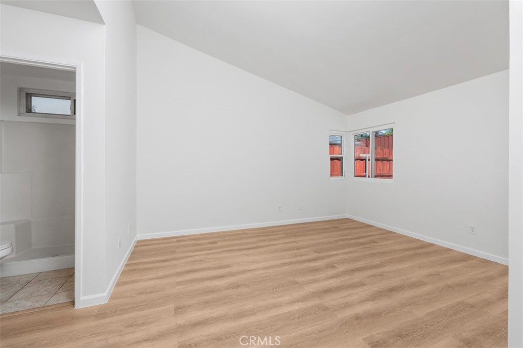 10424 2nd Street Santee, CA 92071 - Photo 19 of 28 Bright bedroom features updated flooring, neutral walls, and a simple layout that is easy to personalize. The space feels fresh, comfortable, and ready to enjoy.