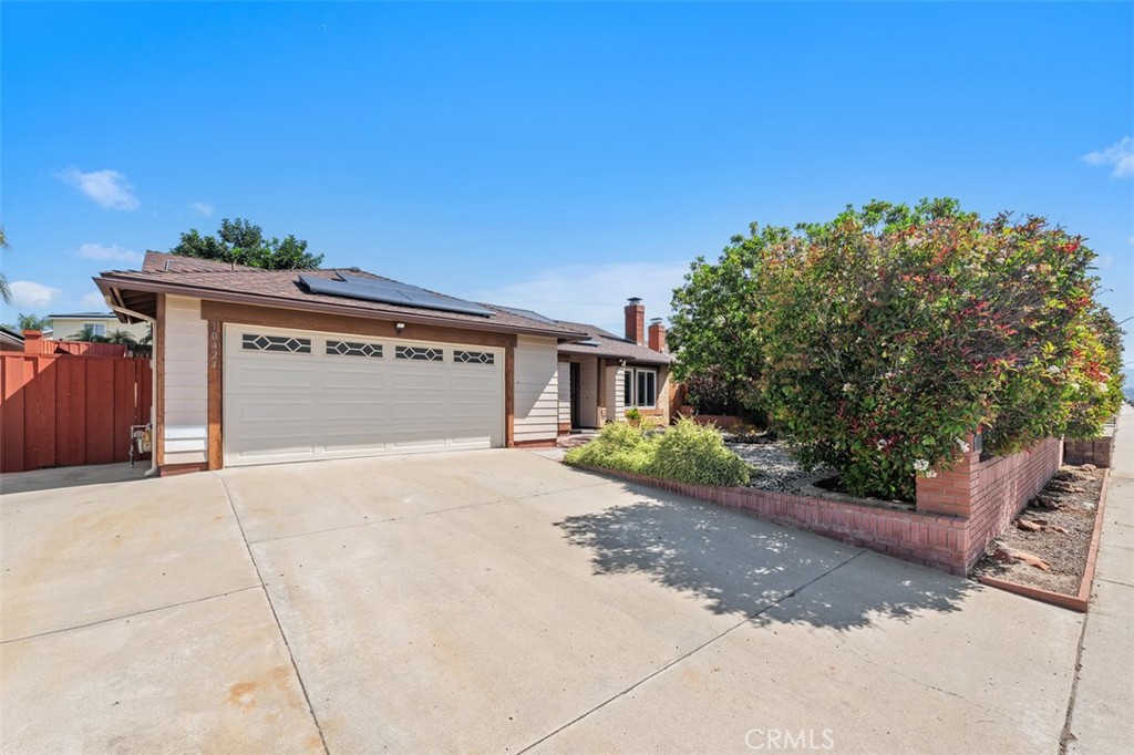 10424 2nd Street Santee, CA 92071 - Photo 4 of 28 Spacious driveway and front entry offer plenty of room for everyday convenience while showcasing the home’s attractive exterior. The layout feels open and functional from the start.
