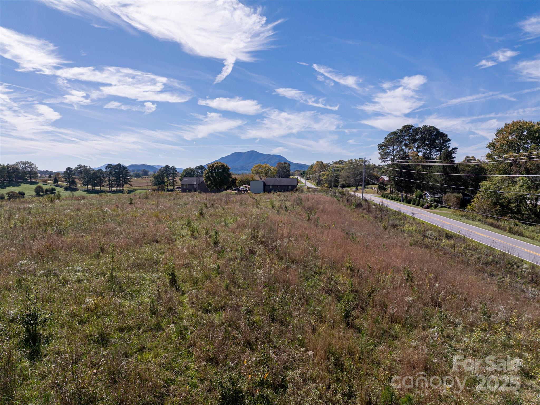 0 East Nc Highway, Unit LOT 55 Mill Spring, NC 28756 - Photo 13 of 17 a view of an outdoor space and mountain view