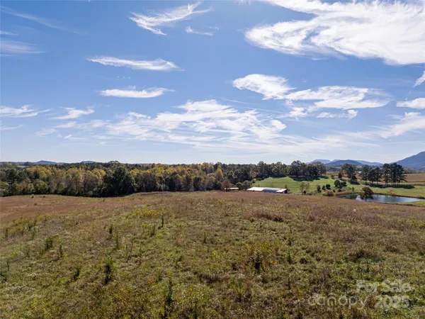 a view of mountain with lake view