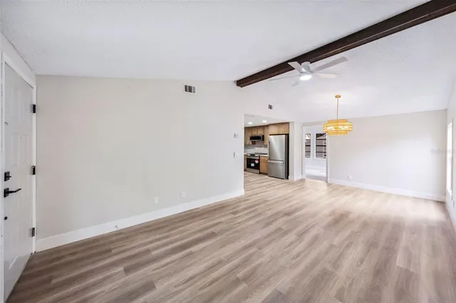 a view of a storage & utility room with wooden floor