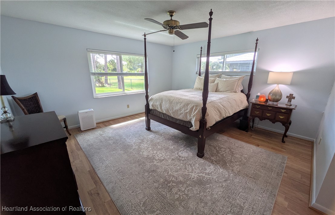 2708 Par Road Sebring, FL 33872 - Photo 13 of 33 a bedroom with a bed window and couch