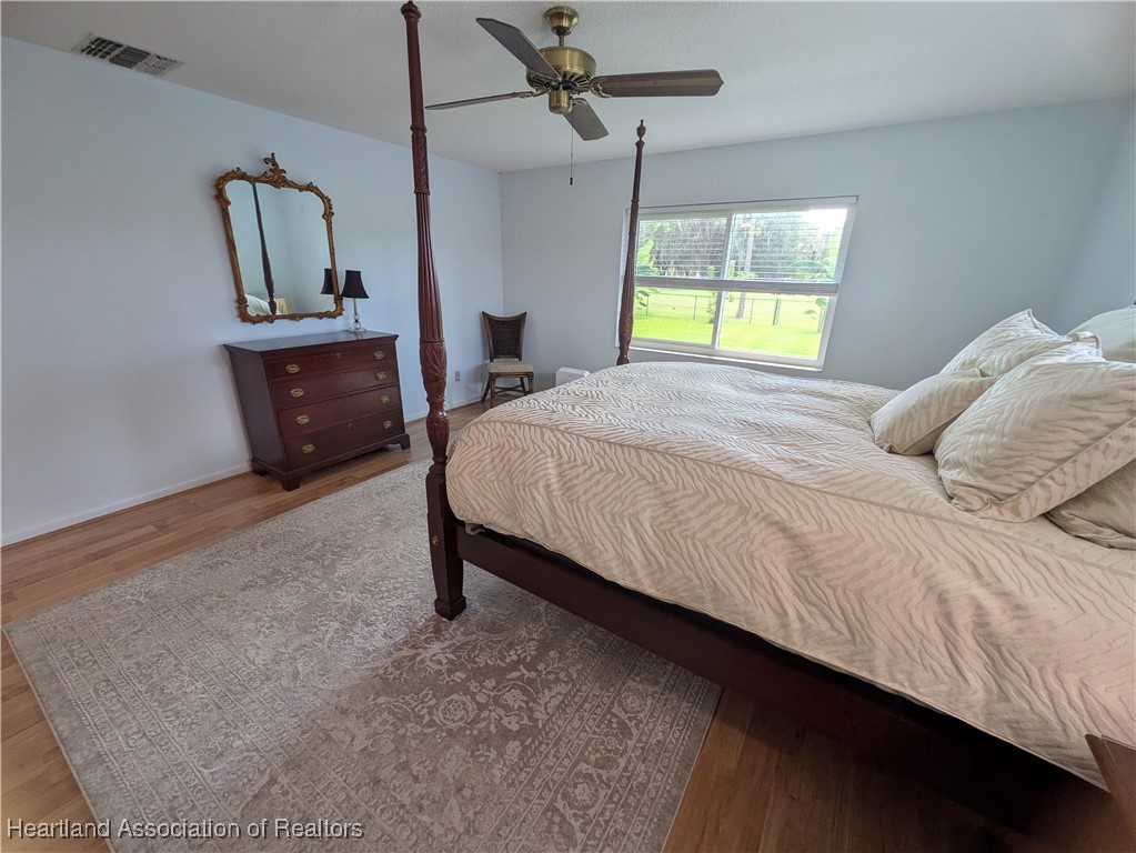 2708 Par Road Sebring, FL 33872 - Photo 14 of 33 a bedroom with a bed and a window