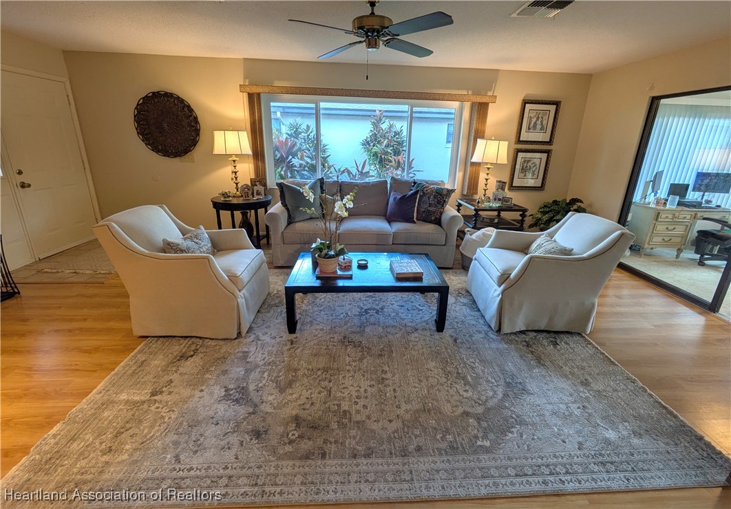 2708 Par Road Sebring, FL 33872 - Photo 3 of 33 a living room with furniture and a large window