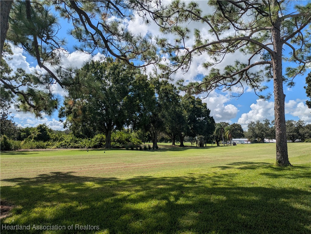 2708 Par Road Sebring, FL 33872 - Photo 32 of 33 a view of a golf course with a trees