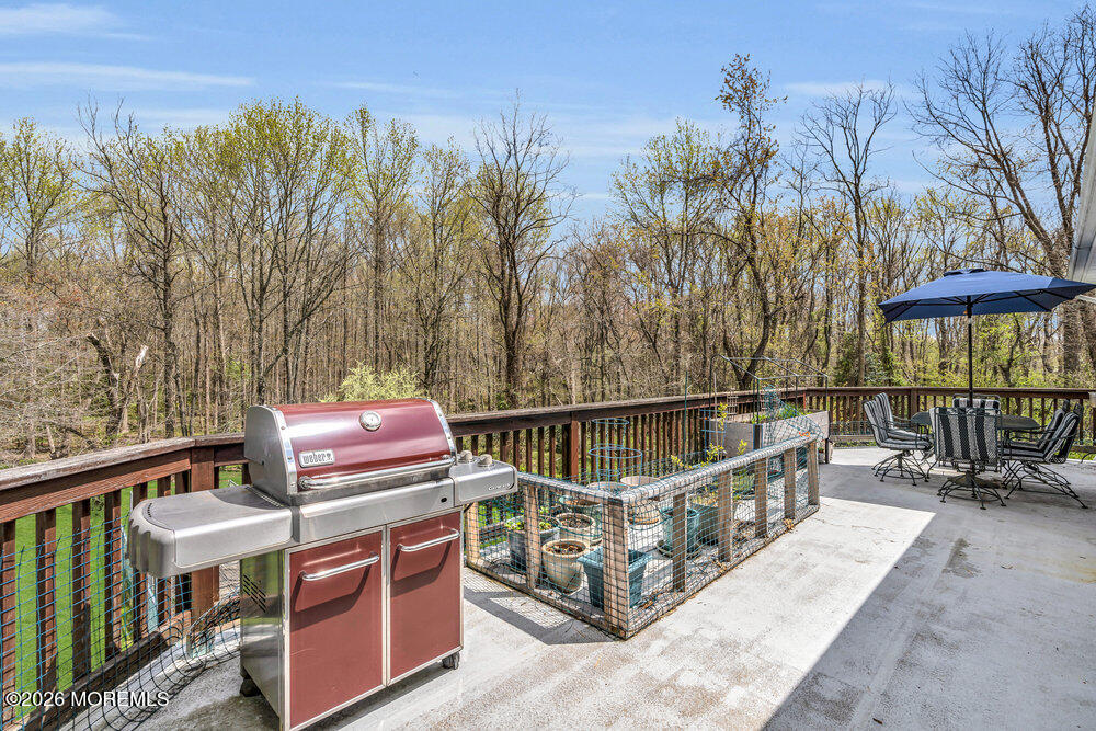 34 State Route Colts Neck, NJ 07722 - Photo 32 of 40 a view of a balcony with chairs