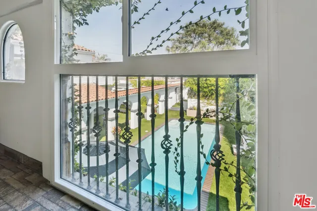 a bathroom with a double vanity sink mirror and shower