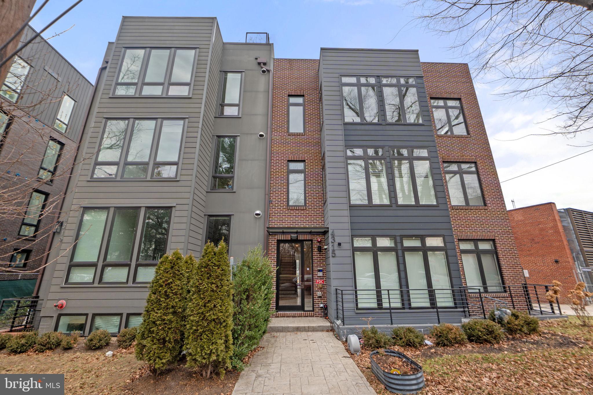 4315 Harrison Street Northwest, Unit 5 Washington, DC 20015 - Photo 1 of 33 front view of a brick building