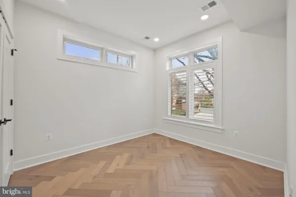 an empty room with windows