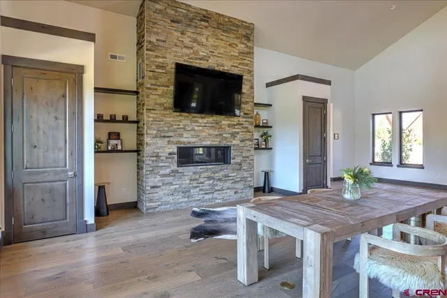 a room with furniture and wooden floor