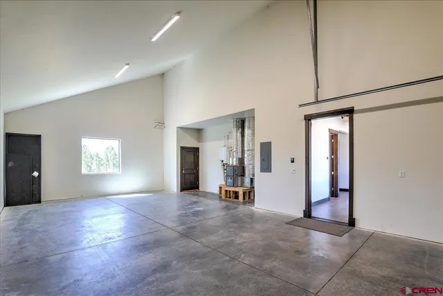a view of deck with table and chairs a barbeque with wooden floor and fence