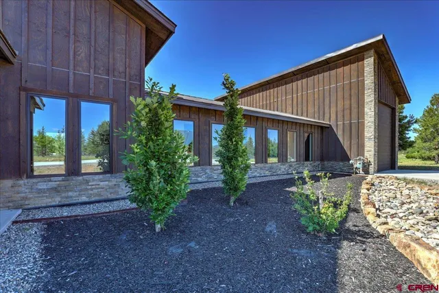 a house view with a lake view