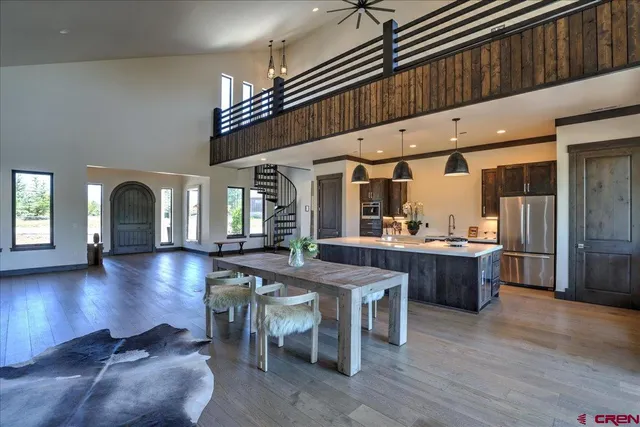 a lobby with furniture and wooden floor