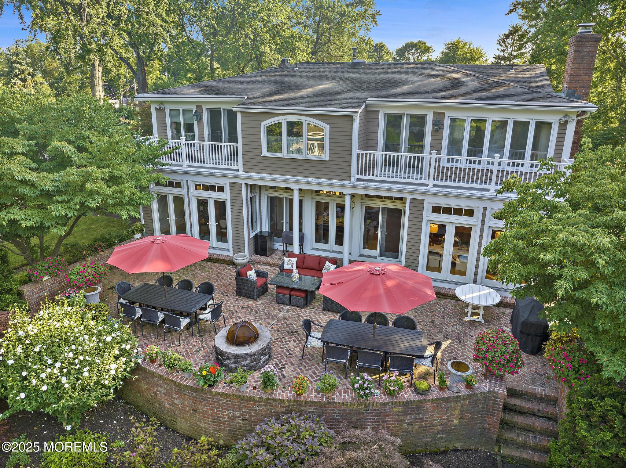 an outdoor space with furniture and umbrella
