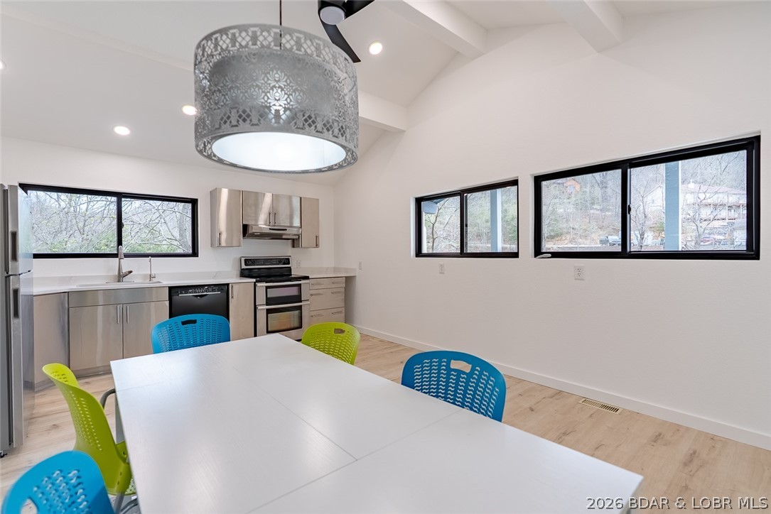 131 Frudeger Road Lake Ozark, MO 65049 - Photo 15 of 78 Lots of windows in the kitchen!