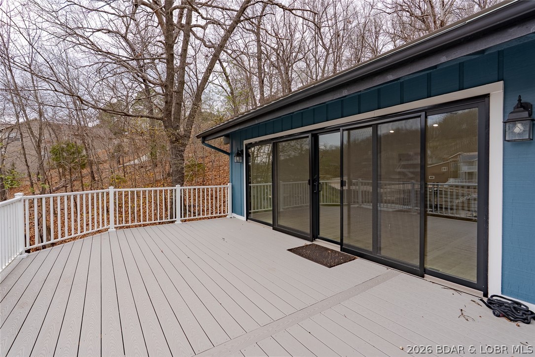 131 Frudeger Road Lake Ozark, MO 65049 - Photo 16 of 78 Huge main level deck off living room