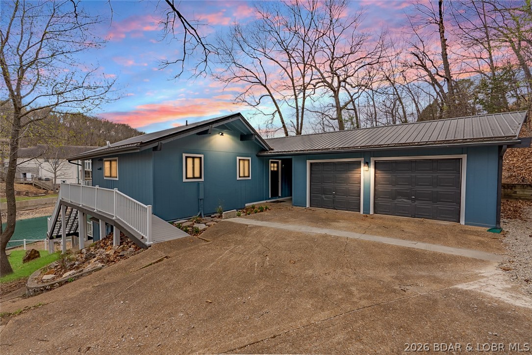 131 Frudeger Road Lake Ozark, MO 65049 - Photo 2 of 78 Plenty of parking and sunsets year round!