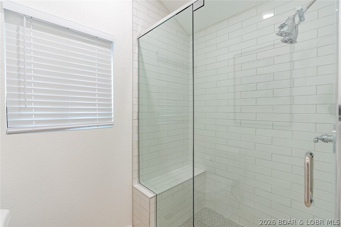 131 Frudeger Road Lake Ozark, MO 65049 - Photo 28 of 78 Main floor suite tiled shower