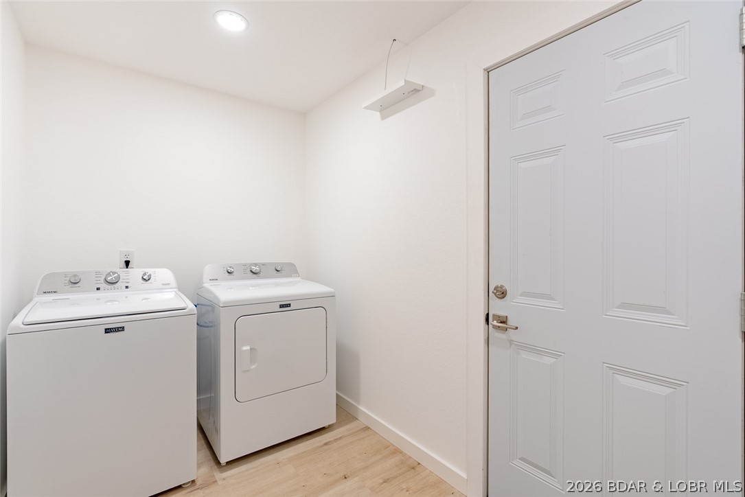 131 Frudeger Road Lake Ozark, MO 65049 - Photo 31 of 78 Laundry room has door to garage
