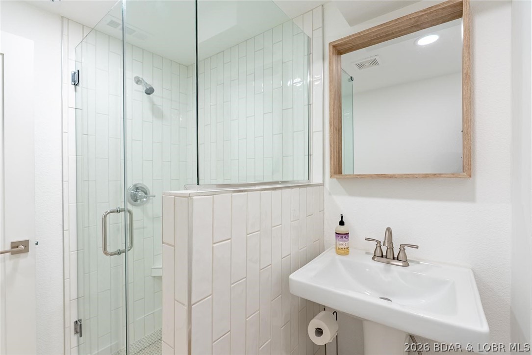 131 Frudeger Road Lake Ozark, MO 65049 - Photo 38 of 78 Lower level guest bath