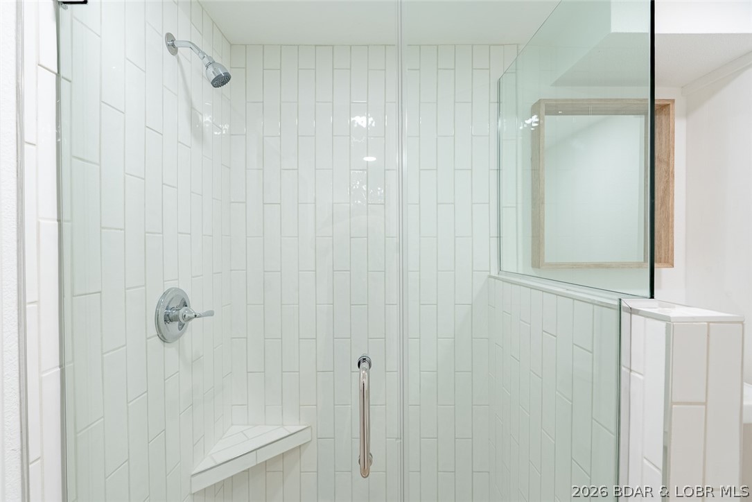 131 Frudeger Road Lake Ozark, MO 65049 - Photo 40 of 78 Tiled shower guest bath