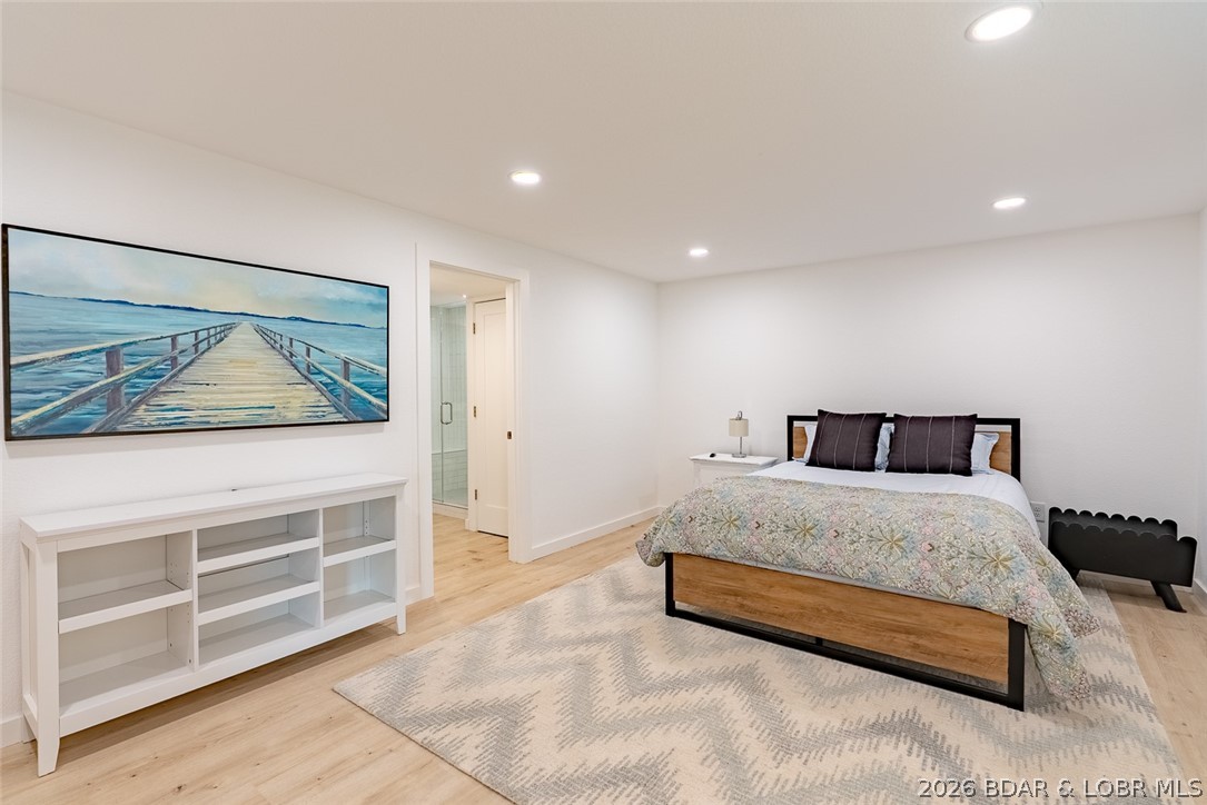 131 Frudeger Road Lake Ozark, MO 65049 - Photo 42 of 78 Primary suite on lower level