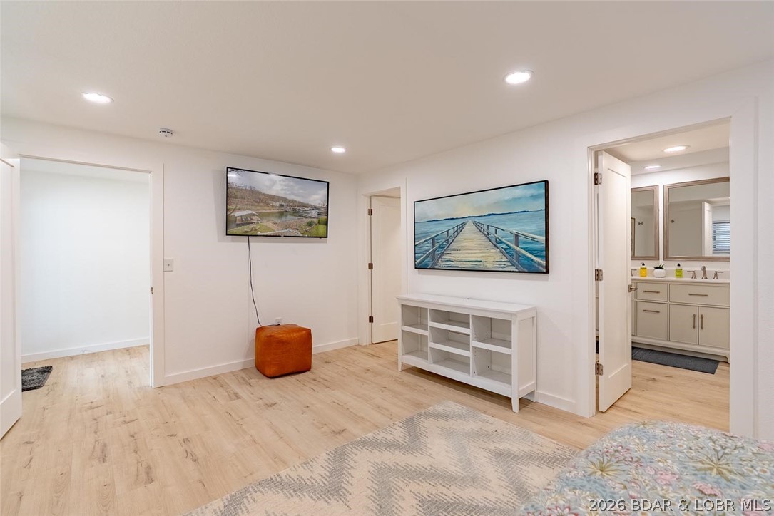 131 Frudeger Road Lake Ozark, MO 65049 - Photo 43 of 78 Lower level primary suite has private bath and wal