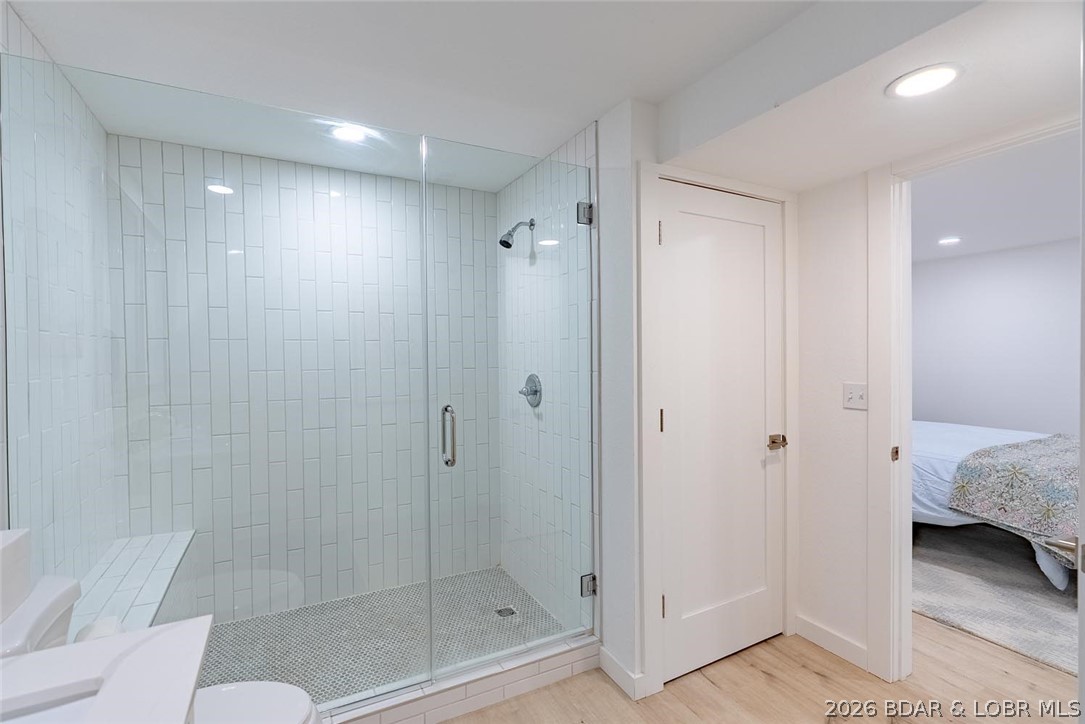 131 Frudeger Road Lake Ozark, MO 65049 - Photo 48 of 78 Primary bath w/large walk in tiled shower and line