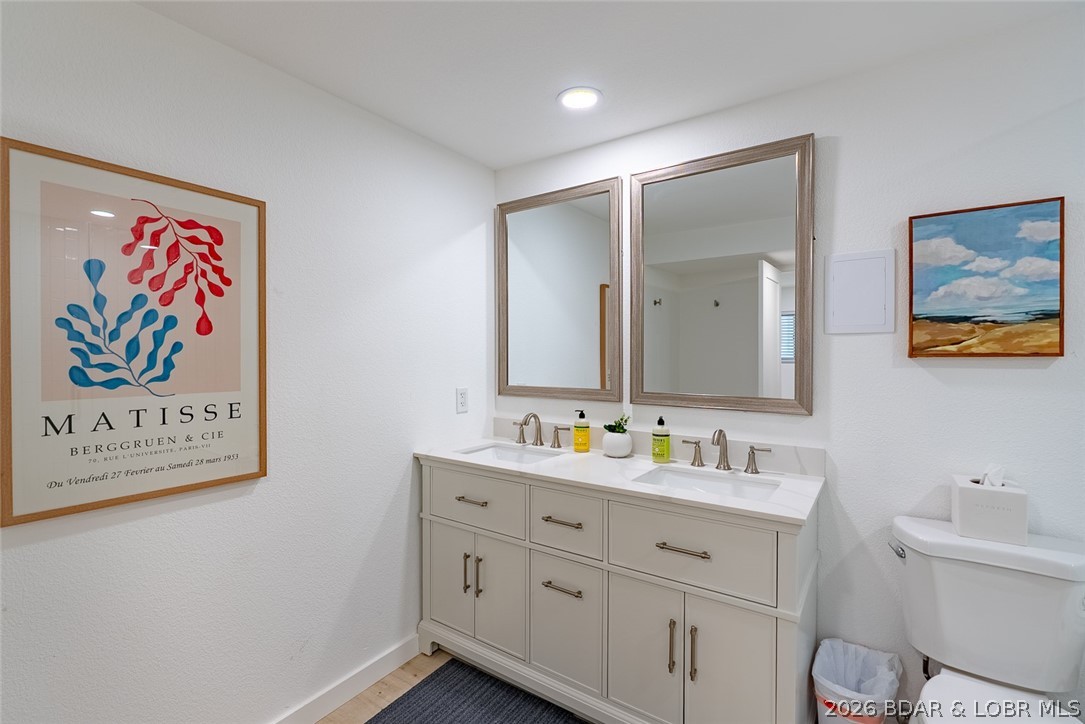 131 Frudeger Road Lake Ozark, MO 65049 - Photo 49 of 78 Double vanity in primary suite bath