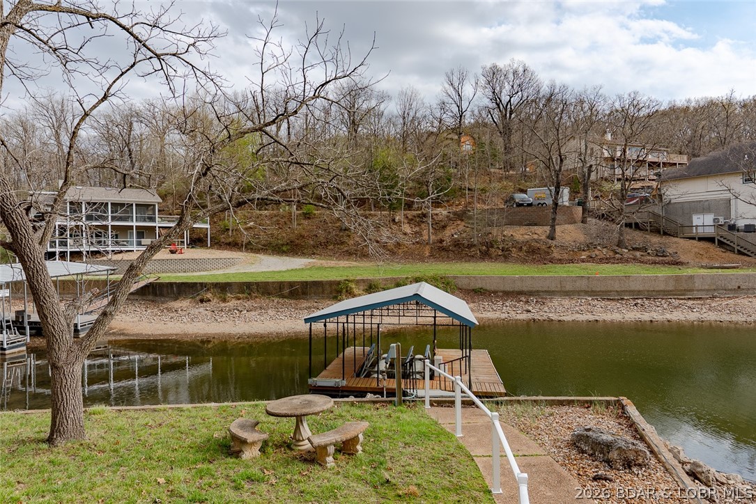 131 Frudeger Road Lake Ozark, MO 65049 - Photo 54 of 78 Smaller wood dock on property w/boat hoist