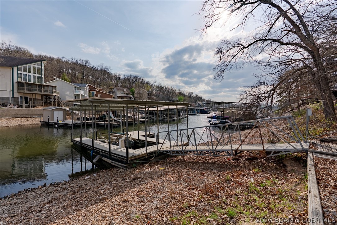 131 Frudeger Road Lake Ozark, MO 65049 - Photo 59 of 78 Nice concrete dock w/swim platform and hoist - WAT
