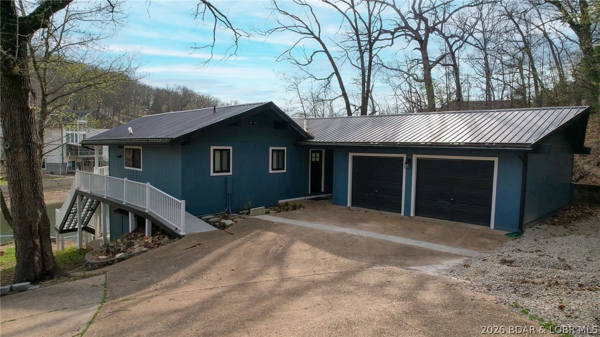 131 Frudeger Road Lake Ozark, MO 65049 - Photo 61 of 78 Metal roof and gutters for less maintenance