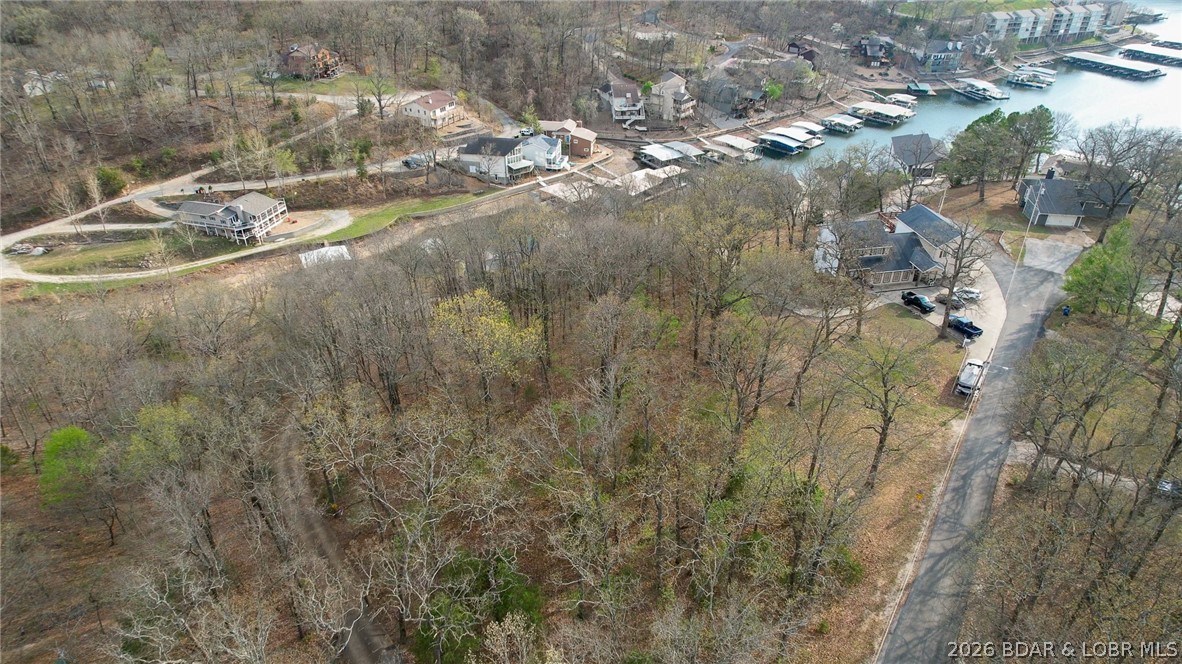131 Frudeger Road Lake Ozark, MO 65049 - Photo 68 of 78 Aerial of wooded acreage and driveway