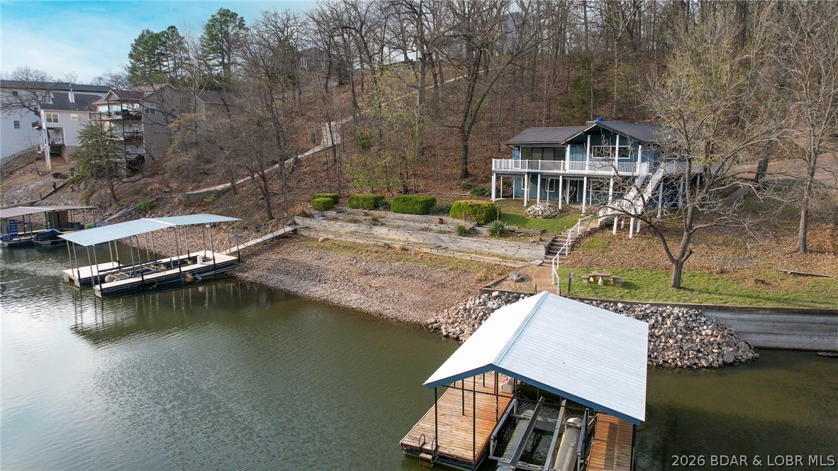 131 Frudeger Road Lake Ozark, MO 65049 - Photo 69 of 78 View of both docks - seawall goes further back in