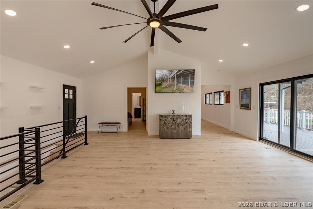 131 Frudeger Road Lake Ozark, MO 65049 - Photo 7 of 78 New stair railings, lighting, fans, flooring, pain