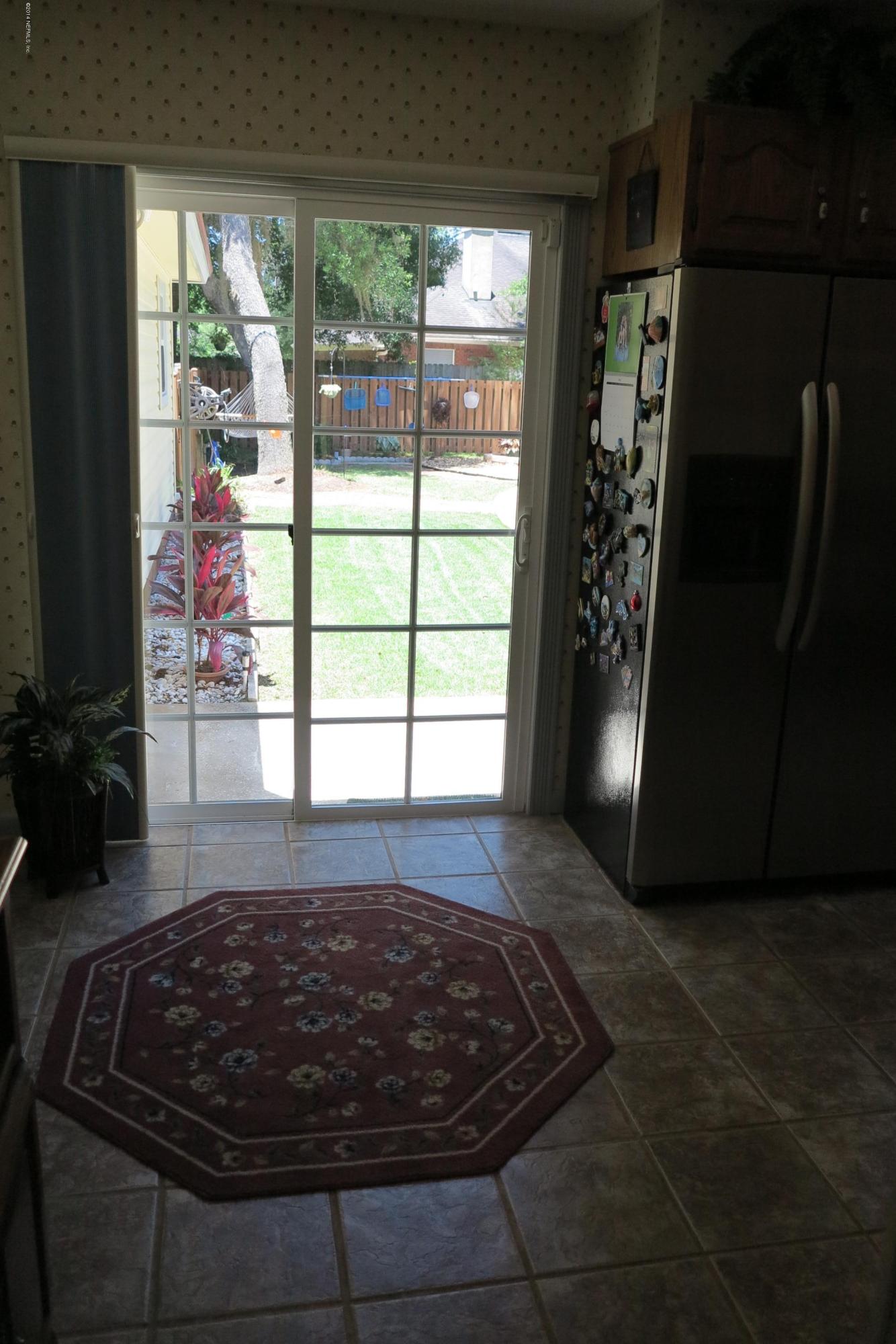 2095 Orange Picker Road Jacksonville, FL 32223 - Photo 20 of 67 Sliding Glass Doors lead out to Pool