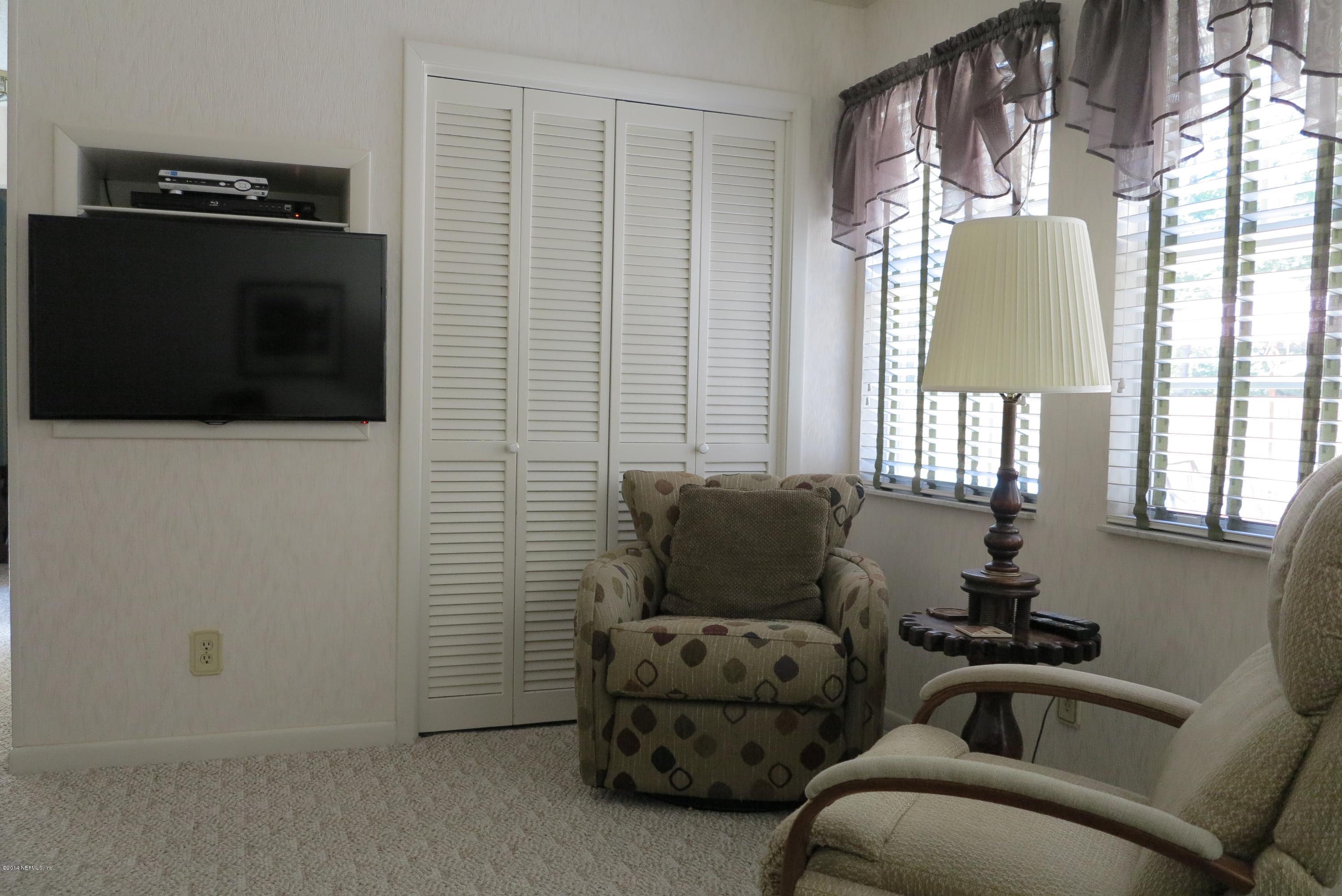 2095 Orange Picker Road Jacksonville, FL 32223 - Photo 22 of 67 Family Room over looks backyard & pool