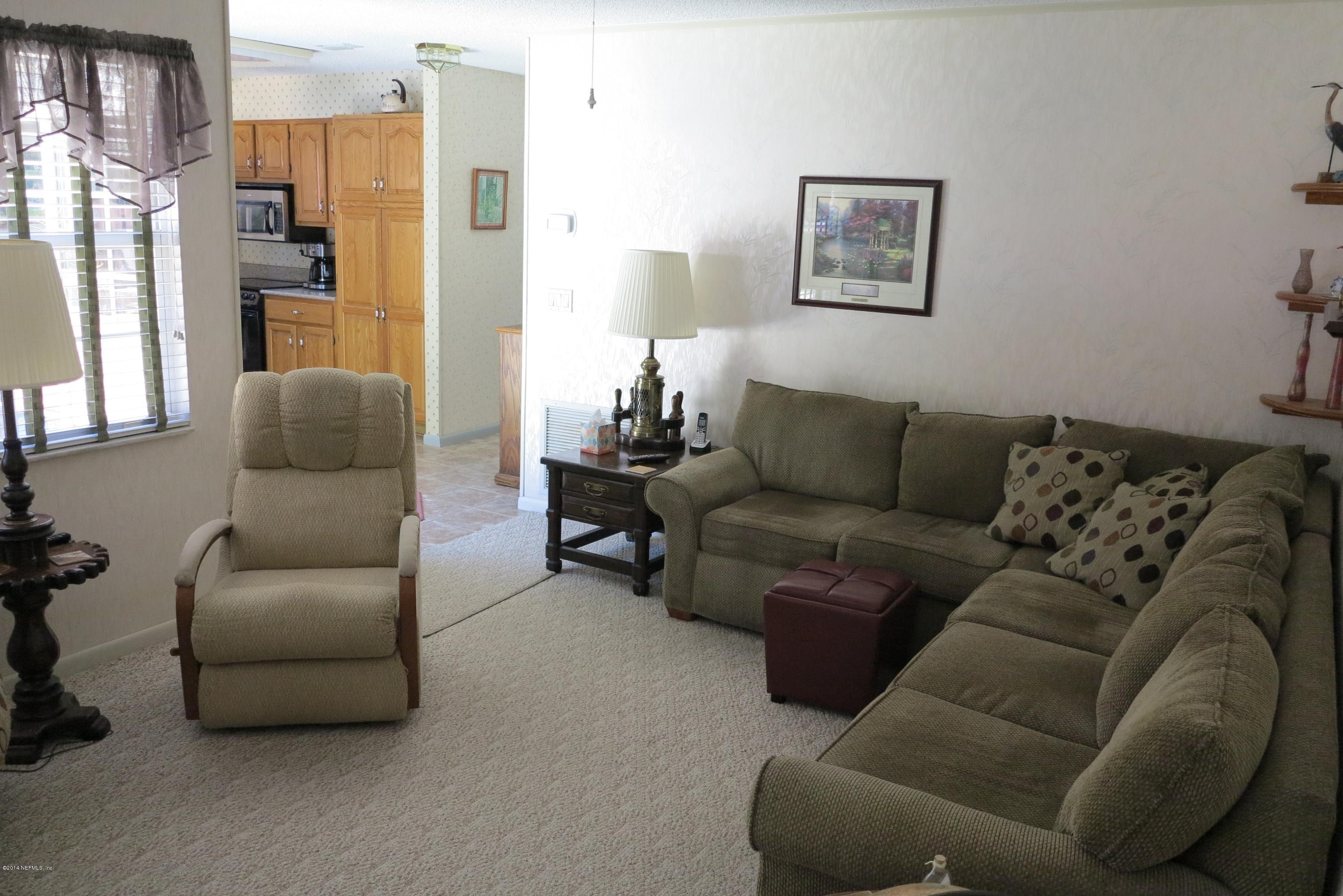 2095 Orange Picker Road Jacksonville, FL 32223 - Photo 23 of 67 Family Room Looking back into kitchen