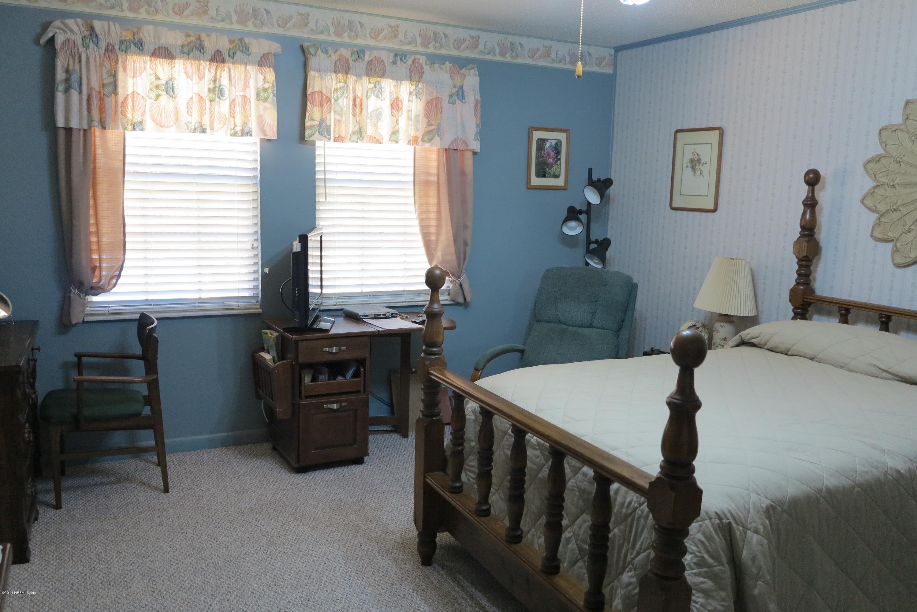 2095 Orange Picker Road Jacksonville, FL 32223 - Photo 25 of 67 Master Bedroom looks out to pool