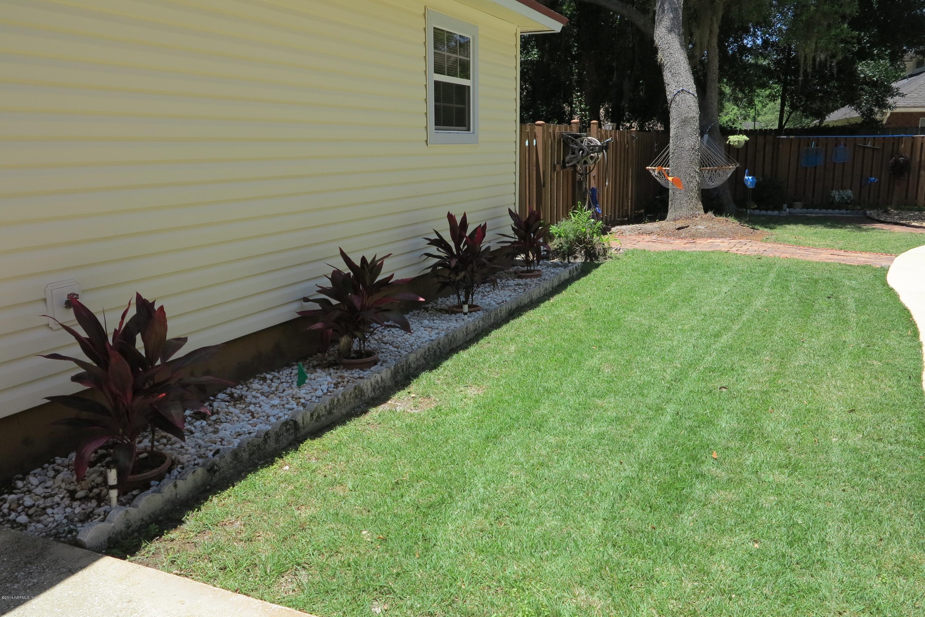 2095 Orange Picker Road Jacksonville, FL 32223 - Photo 46 of 67 Back Yard Landscaping around pool